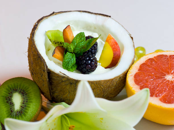 istock Coconut with Cream and Fresh Fruits 941689884