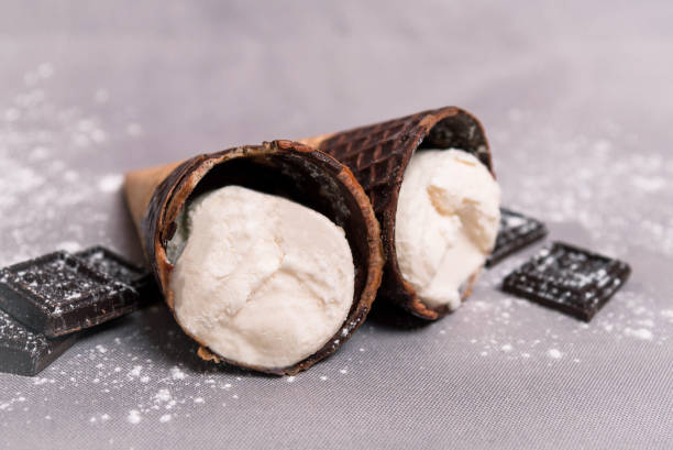 istock Ice cream in a horn with chocolate 941691106