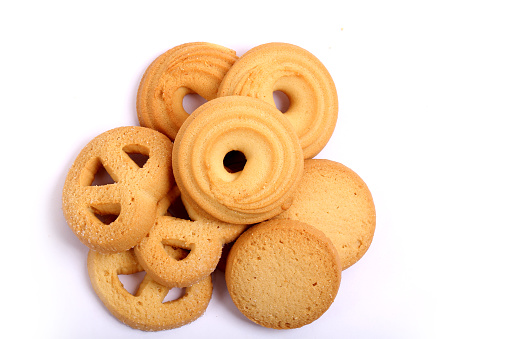 Danish butter cookies, butter cookies on white in different angles