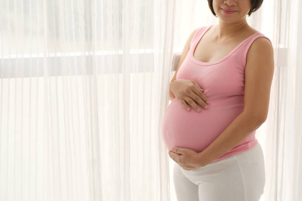 istock Pregnant Woman at Home 941694856