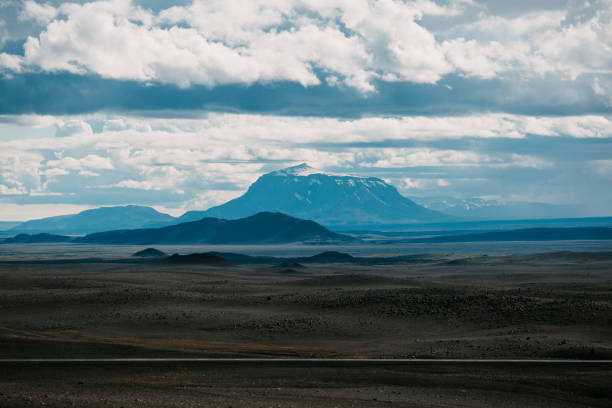 istock majestic landscape with plain and mountains at cloudy day in iceland 941698266