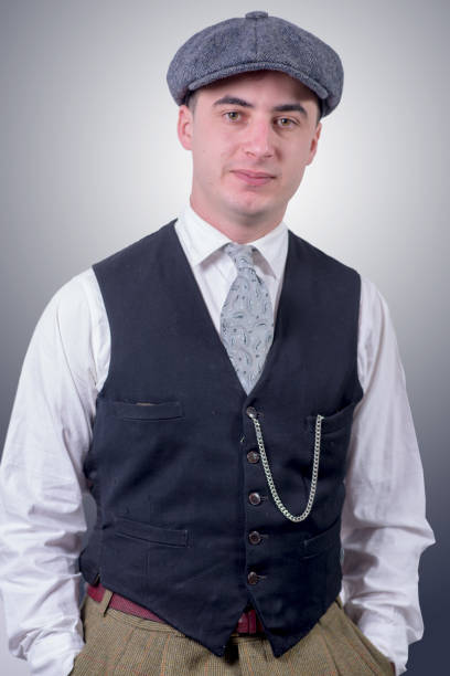 istock a young man in vintage clothes with hat, 1930 style 941701900