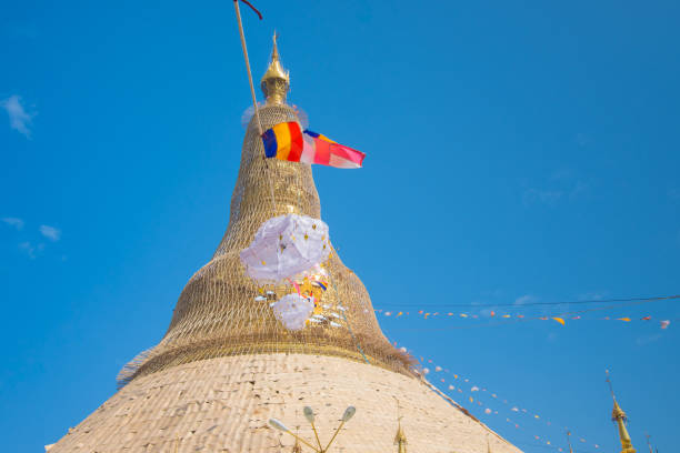 istock Shwedagon pagoda with blue sky. Yangon. Myanmar or Burma. 941705726
