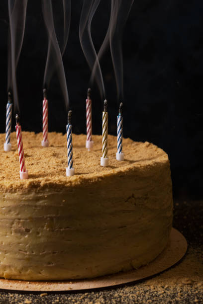istock Traditional napoleon cake with smoke over candles 941711280