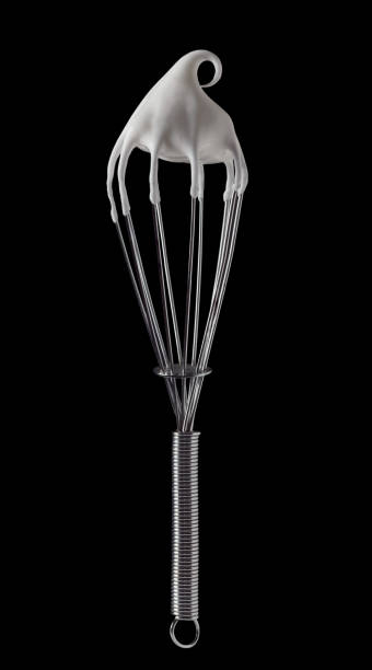 istock Whisk with meringue cream isolated on black 941711634