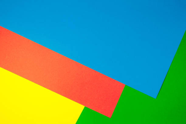 istock Color papers geometry flat composition background with yellow, green, red and blue tones 941711686