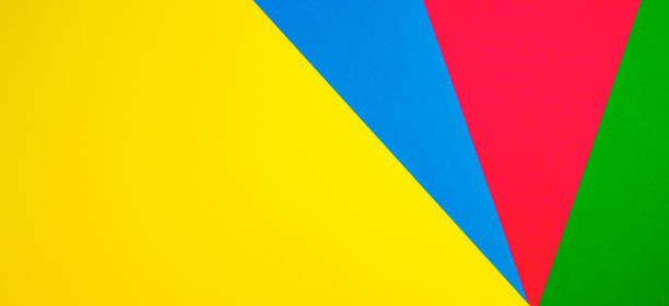 istock Color papers geometry flat composition background with yellow, green, red and blue tones 941711742