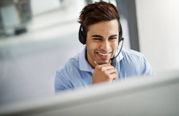 istock Helping his customers one smile at a time 941712344