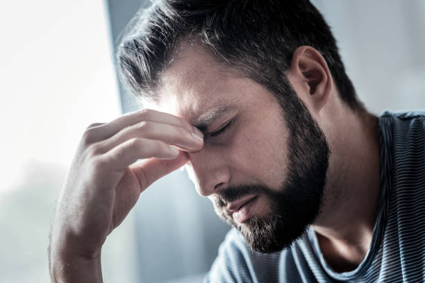 istock Portrait of a cheerless unhappy man 941715838