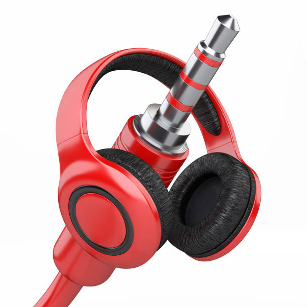 istock Red headphones with 3.5 mm jack plug. 941716072