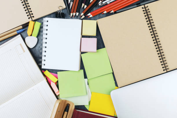 istock Messy desk with supplies 941719252