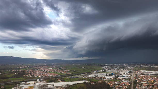 istock Large shelf cloud over city, summer storm 941719704