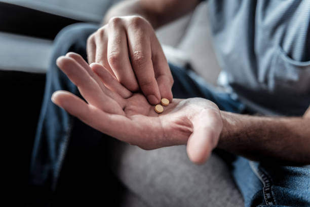 istock Close up of two pills 941719852
