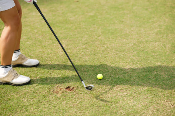 istock Female Golfer Sharpening Skills 941720254