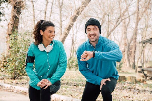 istock Fitness instructor ending outdoor training with a client 941724192