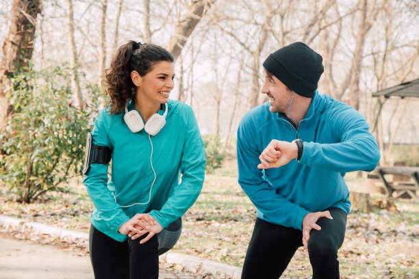 istock Joyful athletic couple exercising outdoors 941724230