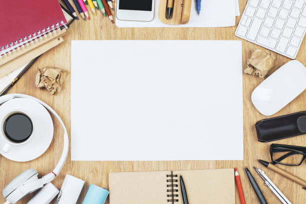 istock Office desk with smartphone and supplies 941728970