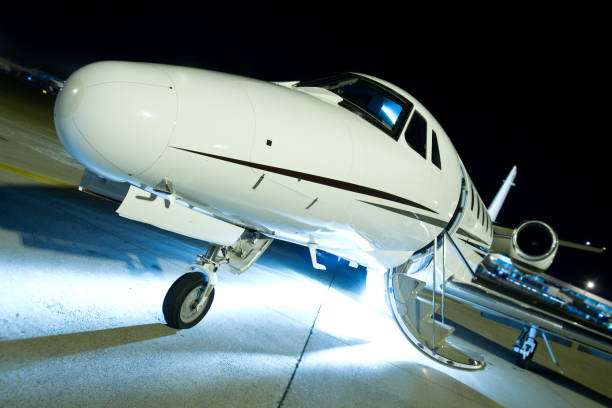 Business jet on a runaway ready for boarding stock photo
