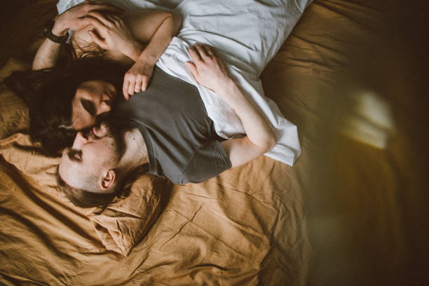 istock Heterosexual couple resting at home 941734324