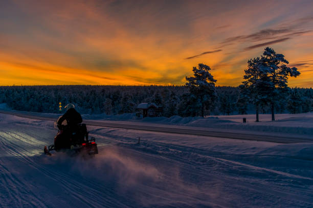 istock Sunset Snow scooter drive 941736750