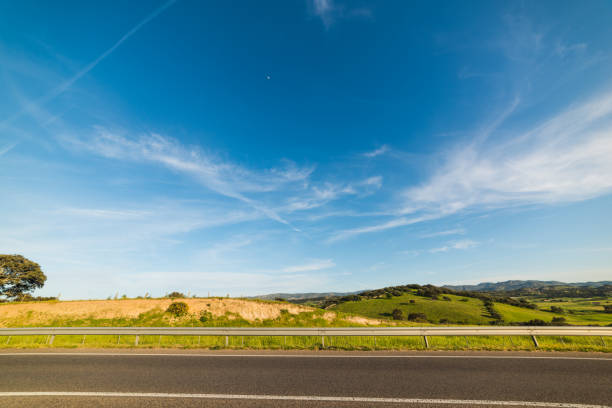 Blue sky over a country road in Sardinia, Italy