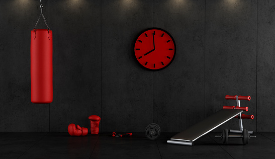 Red and black boxing gym with punching bag ,boxing gloves and bench 3d rendering
Note: the room does not exist in reality, Property model is not necessary
