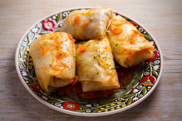 istock Cabbage rolls with meat, rice and vegetables. Stuffed cabbage leaves with meat. Chou farci, dolma, sarma, golubtsy or golabki 941741808