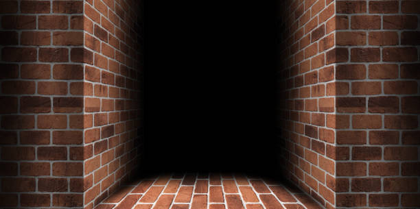 Corner brick wall go to the dark