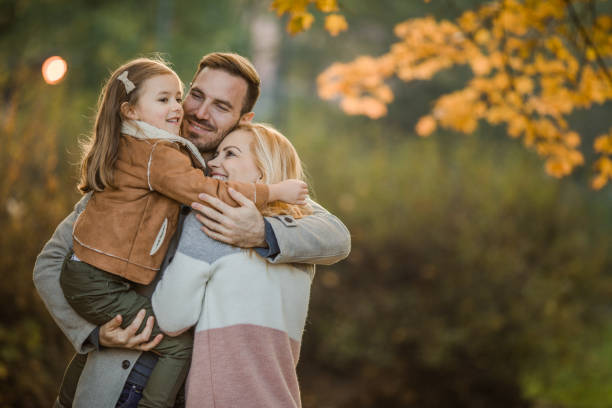 istock Affectionate family in autumn! 941742638