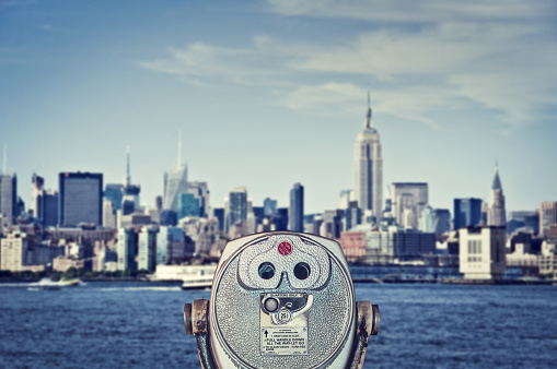 Vintage binoculars viewer, Manhattan skyline with the Empire State Building, New York City, USA