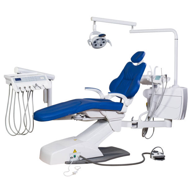 istock Modern blue dentist chair isolated on white background 941749514