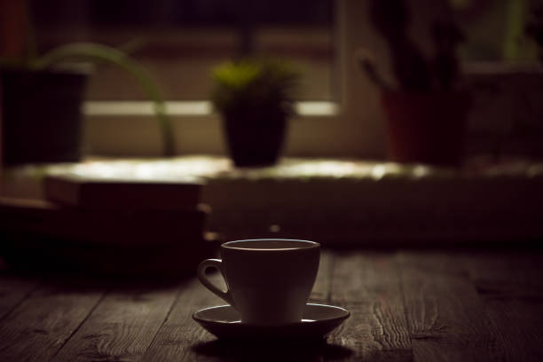istock A cup of coffee in the workplace on a wooden table. 941749702