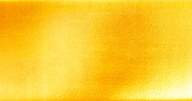 istock Shiny yellow leaf gold foil texture 941756980