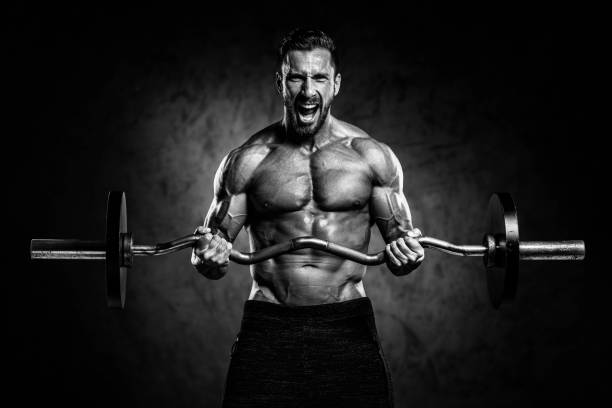 exercice de remise en forme masculine athele - muscular build body building abdominal muscle barbell photos et images de collection