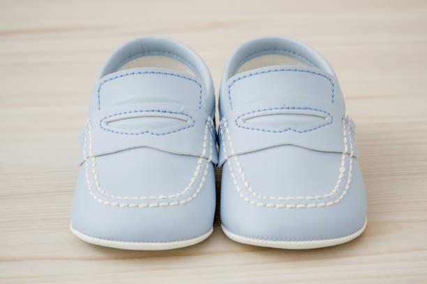 istock Pair of  Classic Blue Baby Shoes 941758372