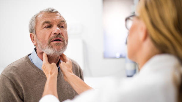 istock Doctor examining external gland 941762272