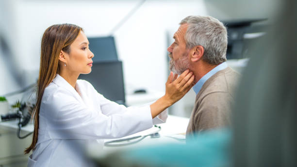 istock Doctor examining external gland 941762386