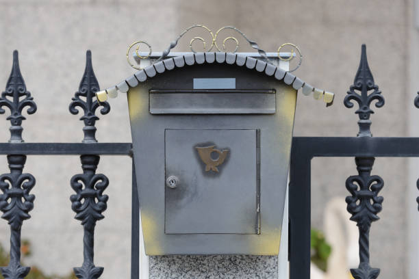 istock gray metal mailbox close-up 941765640