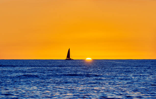 istock Sailboat Sailing During at Sunset, Hawaii 941770812