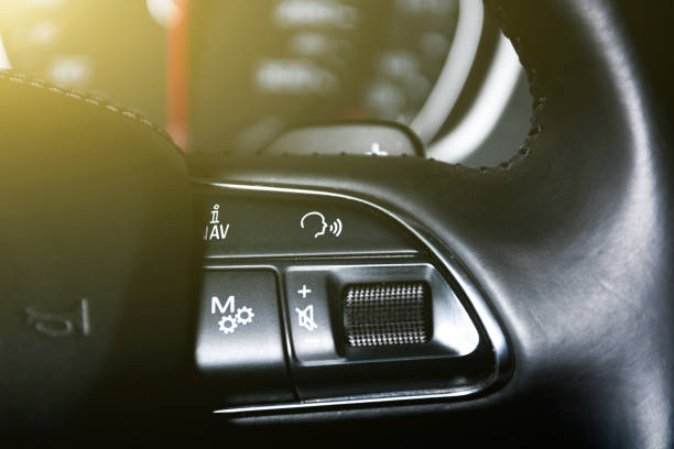 istock Cruise control and speed limiter buttons on the car steering wheel 941770848