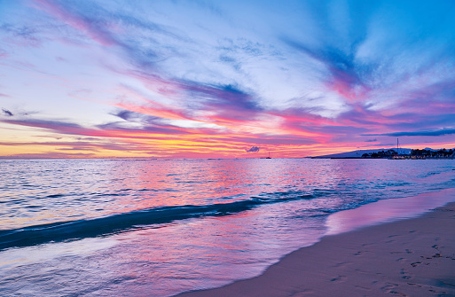 Romance beach and ocean in dramatic sky at sunset, Hawaii, USA.