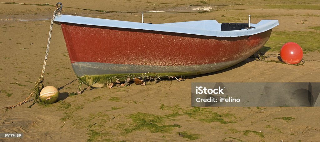 Stranded boat  Algae Stock Photo