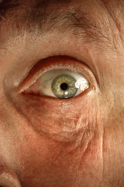 istock Close-up view on the eye of senior man 941776032