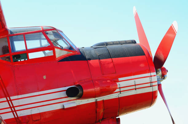 istock Nose of a large red airplane 941776050