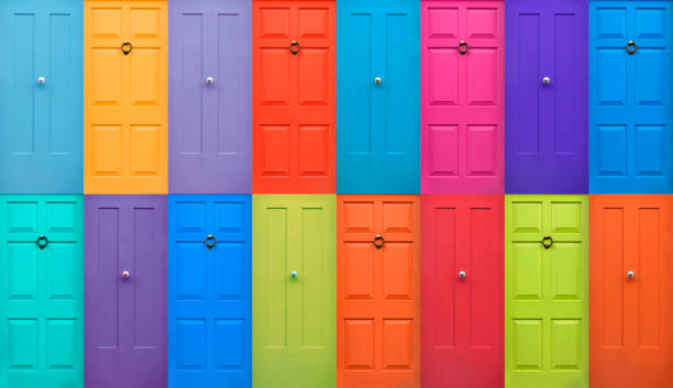 Colourful English Doors Colourful English Doors blue house red door stock pictures, royalty-free photos & images