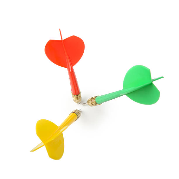 Red yellow and green game darts no bulls eye stock photo