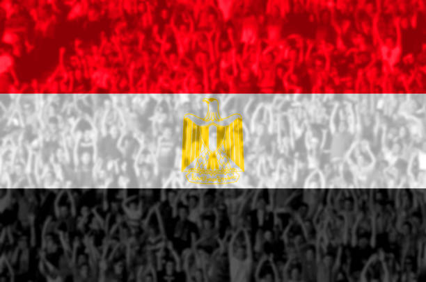 istock Football fans with blending Egypt flag 941781720