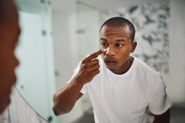 istock Upping his skincare game 941785336