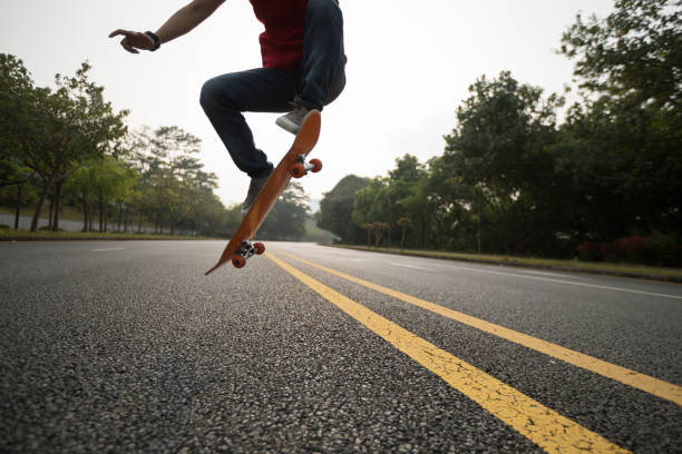 istock Riding skateboard on city street 941788762