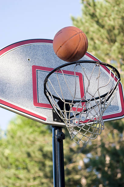 istock Basketball flying towards a basket 94178878